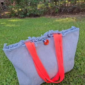 Bolso estera azul asas fucsia